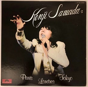 {{productViewItem.photos[photoViewList.activeNavIndex].Alt || productViewItem.photos[photoViewList.activeNavIndex].Description || 'KENJI SAWADA - Paris Londres Tokyo'}}